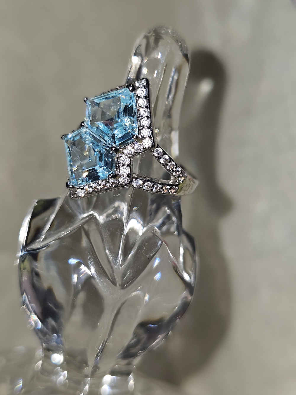 bp Silver Ring with Light Blue Stones and Pavé Accents